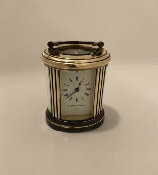 Vintage Matthew Norman 8 Day Miniature Oval Carriage Clock