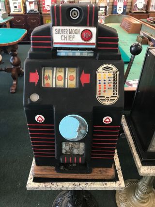 $0.  10 Jennings Silver Moon Chief Vintage Slot Machine.