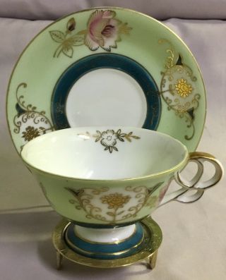 Ucagco Green And Gold Hand Painted Teacup And Saucer With Stand