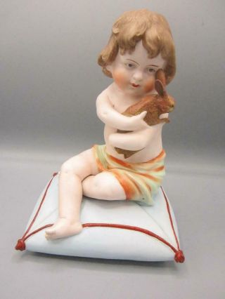 Vintage 9 1/2 " Tall Bisque Porcelain Piano Baby Sitting On Pillow With Bunny