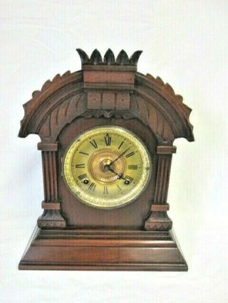 A Victorian Walnut Cased Ansonia Mantel Clock (tunis)