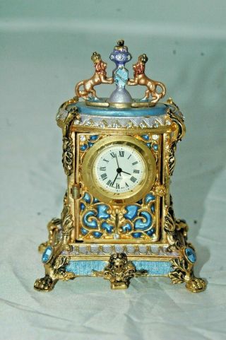 Miniature Ornate Gilt/jewelled Mantle Clock.  P & P U.  K.