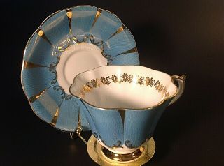 Queen Anne Cup & Saucer.  Scalloped.  Blue With Gold Accents.  Bone China England