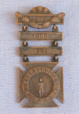 M.  V.  M.  1900,  1902,  1904 Massachusetts Volunteer Militia Sharpshooter Medal