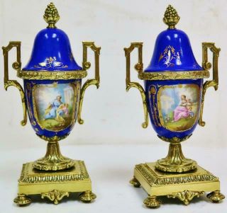 Rare Antique French Gilt Bronze & Blue Sevres Porcelain Clock Garnitures