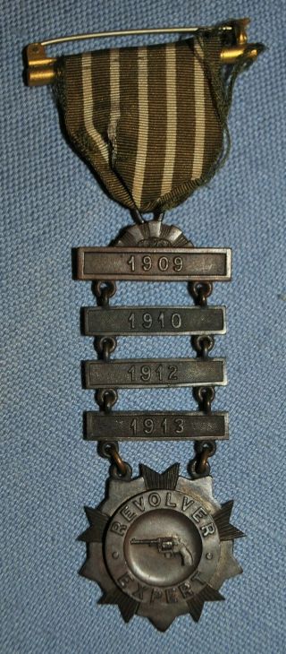 Mass.  Vol.  Militia Revolver Expert Ladder Badge - 1909,  1910,  1912 & 1913