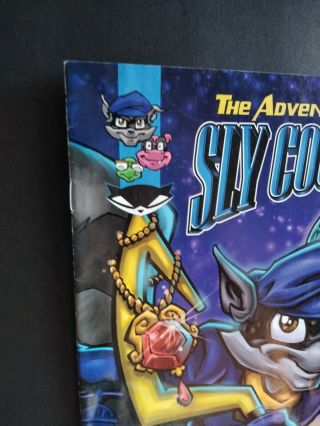 THE ADVENTURES OF SLY COOPER COMIC RARE PROMO VIDEO GAME PS2 SONY 2004 MID GRADE 2