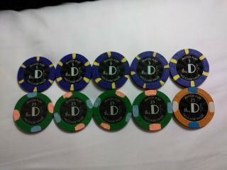 The D Casino Las Vegas Match Play Chips 5 - $25 And 5 - $5.  Total $150 No Cash Val