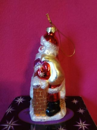 Vintage Christopher Radko Santa Christmas Ornament Santa sitting on top of house 3