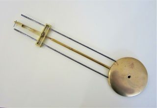 A Very Good Victorian Gridiron Pendulum For An English Fusee Skeleton Clock.