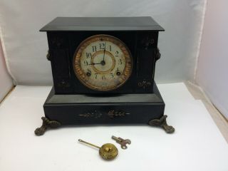 Antique Ansonia Black Iron Mantle Clock Lion Head Sides
