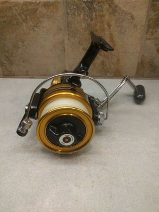 Vintage Penn 650SS Skirted Spool Spinning Reel High Speed 4.  8:1 Black and Gold 3