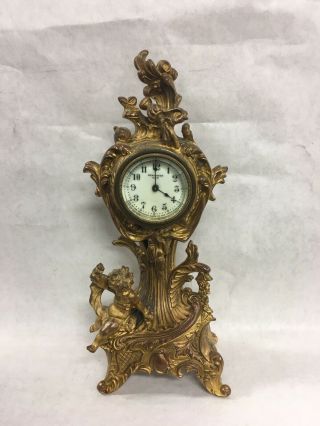 Vintage Haven Clock Co - Cherub Clock.  Cast Metal.