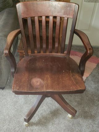 Vintage Lawyers / Bankers / Office Chair Has Casters And Is Solid Wood.