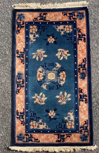 C1940 Chinese Peking Blue Ground Rug.  Floral Salmon Border With Center Medallion