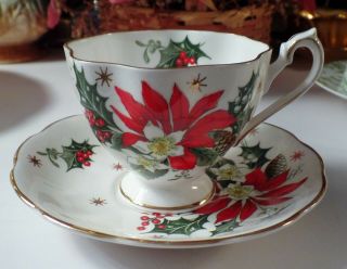 Queen Anne “noel” Poinsettia Christmas Bone China Teacup And Saucer