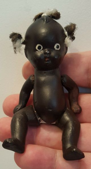 Vintage Black Bisque Baby Doll Made In Japan W/ 3 Tufts Ponytails
