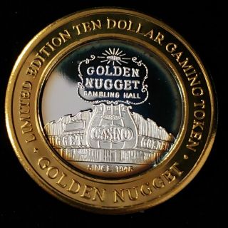 2005 S Golden Nugget Casino.  999 Silver Strike $10 Marquee Game Token (gnc0572