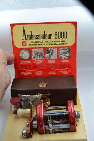 Vintage Abu Garcia Ambassadeur Reel 6000 Burgandy Reel In Display Box