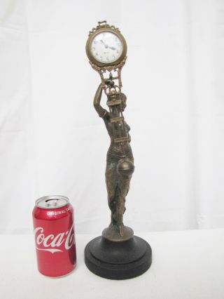 Vintage Bronze Lady Swinging Arm Clock