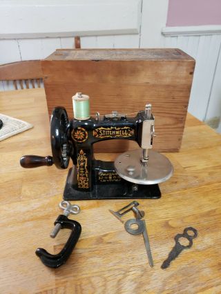 Antique/vintage Stitchwell Toy Sewing Machine - 1920’s - Cast Iron - With Wooden Box