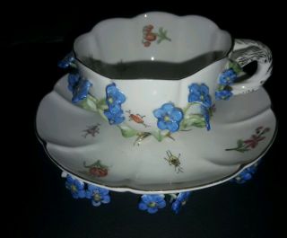 Floral Encrusted Demitasse Cup And Saucer