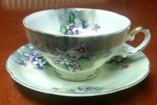 Ucagco Tea Cup And Saucer Floral Pattern With Gold Trim