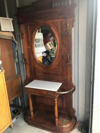 VICTORIAN HALL TREE WITH HOOKS AND BEVELED OVAL MIRROR 2