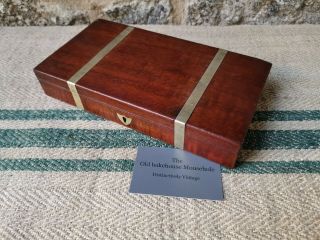 An Antique Mahogany Brass Bound Box