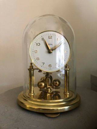 Konrad Mauch (koma) Midget,  400 Day,  Torsion,  Anniversary Clock,  Glass Dome