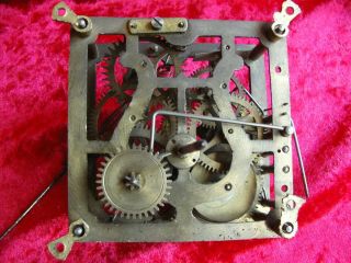 A old harp shaped brass cuckoo clock movement for spares / repair. 2