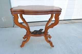 Victorian American Walnut Parlor Table With Carved Sitting Dog