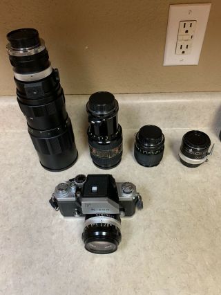 VINTAGE Nikon F 35mm SLR Camera W/4 Lenses and cases 2