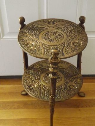 Antique French Brass 2 Tier Table Stand Neo Classical Cherubs Busts Claw Feet