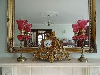 Fine Quality Victorian Style Cranberry Peg Oil Lamps.