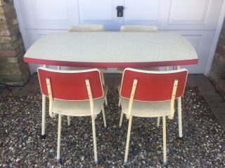 1950s/ 1960s Dining Set Of A Table And Matching Chairs.