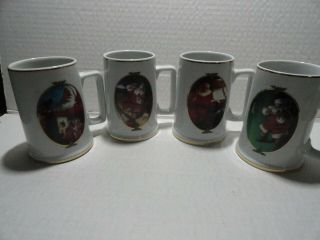 Set Of 4 Different Coca Cola Mugs - Christmas 1996 - Santa - 4 1/2 Inches Tall