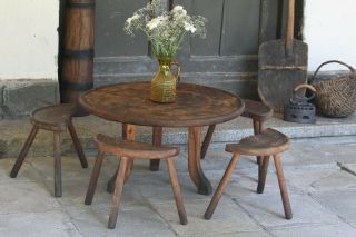 Rustic Primitive Antique Wooden Round Table With 4 Small Three Legged Stools