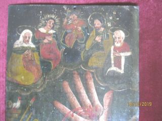 ANTIQUE RETABLO ON TIN WITH THE IMAGES OF THE MANO PODEROSA AND USUAL SYMBOLS 2
