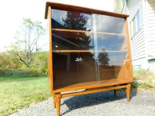 C1969 Mid Century Modern Sliding Door Bookcase Floating Walnut Cone Legs Cabinet