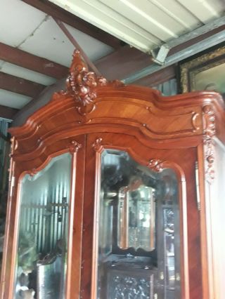 Large French Armoire.  2 Big Beveled Glass Doors,  Carved Top.  Skelton Key.  But