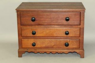 AN EXTREMELY RARE 18TH C PA MINIATURE 3 DRAWER CHEST BRACKET FEET SCROLLED APRON 2