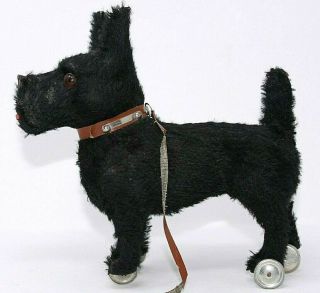 Vintage 8 " Toy Black Scottie Dog On Wheels,  Mohair Over Paper Mache Germany?