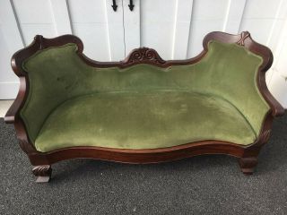 Victorian 1800s Carved Loveseat Settee With Green Upholstery