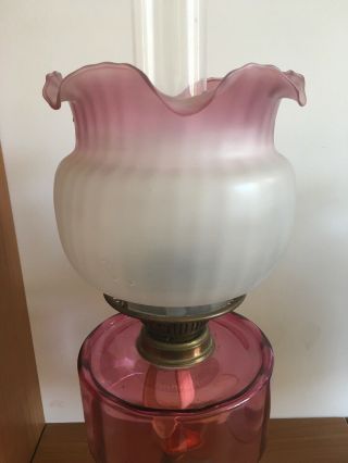 ANTIQUE VICTORIAN CRANBERRY GLASS OIL LAMP WITH METAL PYRAMID BASE 2