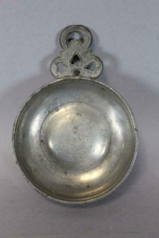 18TH C PEWTER PORRINGER WITH A FULLY DEVELOPED & HEART CUT DECORATED HANDLE 2