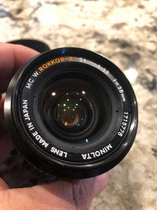 Vintage Minolta Mc W.  Rokkor - X Si 1:2.  5 28mm Prime Lens W/caps/hood/filter Minty