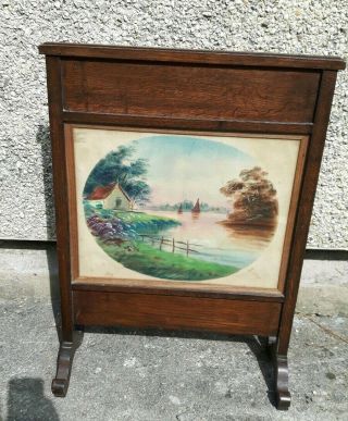 An Oak Framed Edwardian Fire Screen 49cm Wide Colours And Hand Painted
