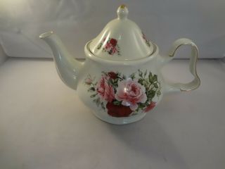 Teapot Formalities By Baum Bros.  Roses