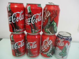 Coca Cola Europe: 7 X empty 330 ml empty cans,  different countries,  90 ' s & on. 2